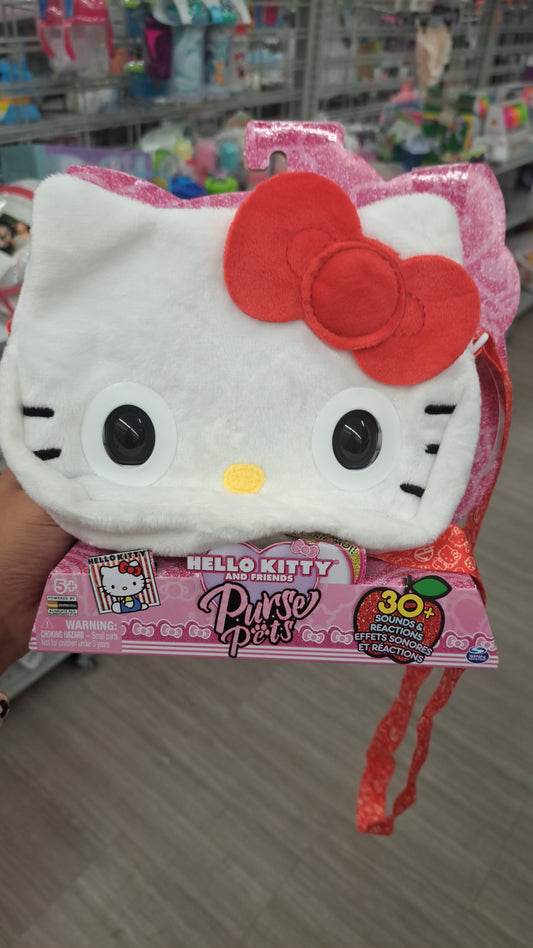 CARTERA Hello Kitty con melodias abre y cierra los ojos